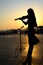 Silhouette of Girl playing the violin