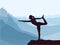 Silhouette of girl practicing yoga. Blue mountains in background