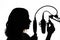 Silhouette of a girl with a studio microphone, radio presenter, singer and blogger, voice acting