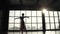 Silhouette of a graceful ballerina against the backdrop of the setting sun.
