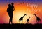 Silhouette graphics Father holding the young on hands and look at the giraffe  outdoor of sunset with grass on the ground for