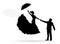 Silhouette of a groom holding his bride. She is flying with an umbrella.