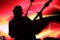 Silhouette Guitar Player with colorful backgrounds