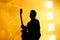 Silhouette of guitar player, guitarist perform on concert stage.