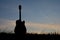 Silhouette guitar at the sky sunset