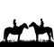 Silhouette of a guy and a girl on horseback, walk