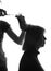 Silhouette hairdresser cutting a client