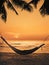 Silhouette hammock on the beach