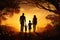 Silhouette of happy family holding hands and walking in the field at sunset, Silhouette of young couple hiker were standing at the