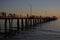 Silhouette of Henley Beach pier at dusk in Adelaide South Australia