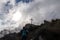 Silhouette of hiking woman from summit near Santa Maria del Castello with scenic view on Positano at Amalfi Coast, Campania, Italy