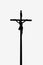 Silhouette of holy cross with crucified Jesus Christ. Ancient statue