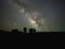 Silhouette of hoodoos under the Milky Way Galaxy