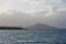 Silhouette horizon with cloudy sky and blue sea