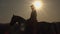 Silhouette horse rider on horse in sunset. Slow motion. Side view