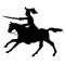 Silhouette of a horseman with a saber. The military cavalry is attacking