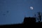 Silhouette of a house at night.