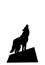 Silhouette of a howling wolf