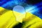 Silhouette of a human head on the background of the flag of Ukraine. The protest of people against the war. Stop the war between