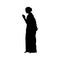 Silhouette Indian woman in greeting or praying pose. Indian culture and religion.