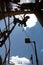 Silhouette industrial hanging working at height wearing helmet using face shield safety equipment protection