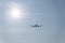 Silhouette of jet taking off into the skies