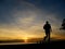 Silhouette of a jogger in sunrise