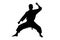 A silhouette of a karate man