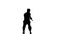 Silhouette of a karate man exercising against