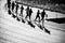 Silhouette of Kenyan runners training on the athletics track in the morning in Eldoret. Illustration photo for marathon, running