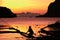 Silhouette of a kid on a beach in El Nido, Palawan island in the Philippines at sunset