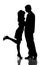 Silhouette of kissing happy couple