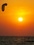 Silhouette of a kitesurfer