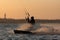 Silhouette of a kitesurfer on the coast of Kiel, Germany at sunset