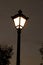 Silhouette of a lantern in the light of the sunset in Millennium