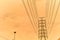 Silhouette line of high voltage electric pole with sunset background