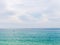 Silhouette of a lonely rower standing up on paddle board in the blue sea. Israel, Tel-Aviv