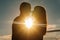 Silhouette of loving couple embracing at sunset