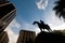 Silhouette of majestic horse soldier knight in the city centre