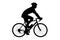 A silhouette of a male biker with helmet biking