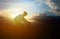 Silhouette of a male mountainbiker at sunset