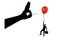 Silhouette of a man in the air clinging to a balloon and a hand with a needle wants to burst it