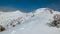 Silhouette of man on a backcountry skiing trip.