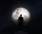 Silhouette of a man on background of the Moon. Elements of this image furnished by NASA