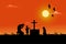 silhouette of a man and a child has a dog beside him. Being sad at the grave Has a sunset background