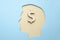 Silhouette of a man with dollar sign in the brain. Money in my head.