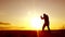 Silhouette of man exercising thai boxing. Silhouette of martial arts man training boxing on the beach over beautiful sunset backgr