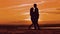 Silhouette man and girl of a happy young married couple slow dancing outside at sunset. Couple enjoying on nature the