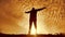 Silhouette of a man with hands raised in the sunset concept for religion, worship, prayer and praise. silhouette of a