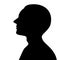 Silhouette of a man looking up with confidence, side view